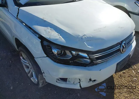 2016 Volkswagen Tiguan Sel z USA, uszkodzony, nr VIN WVGAV7AX1GW577035